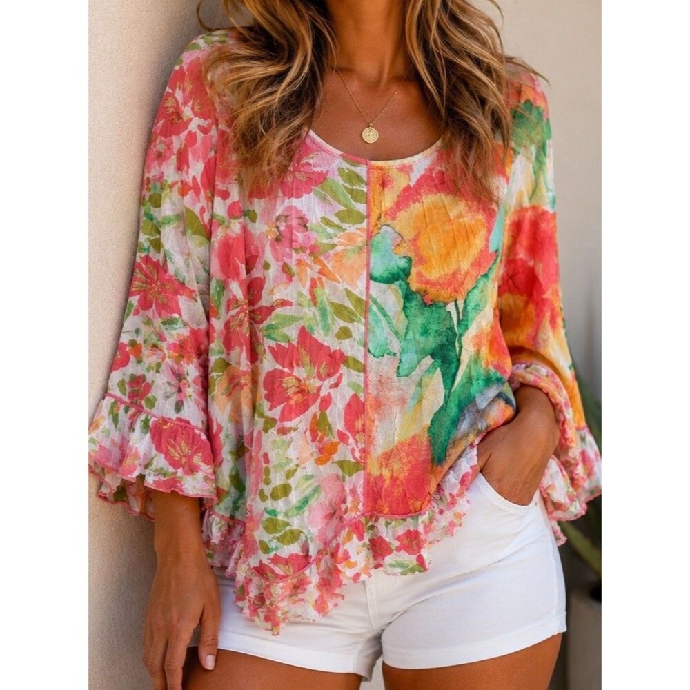 floral-print asymmetrical tunic top featuring a vibrant watercolo